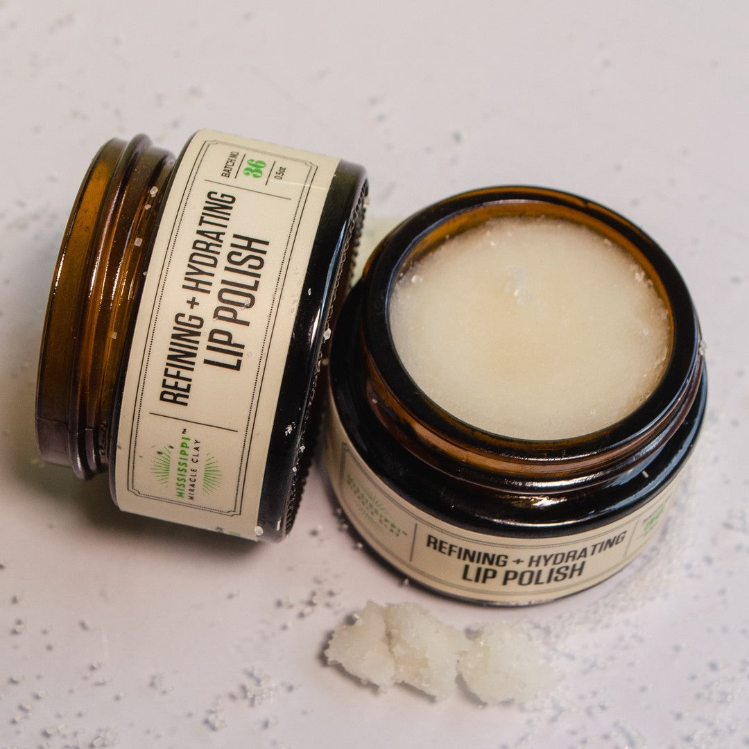 Refining Lip Polish, open and closed jars showing the smooth balm